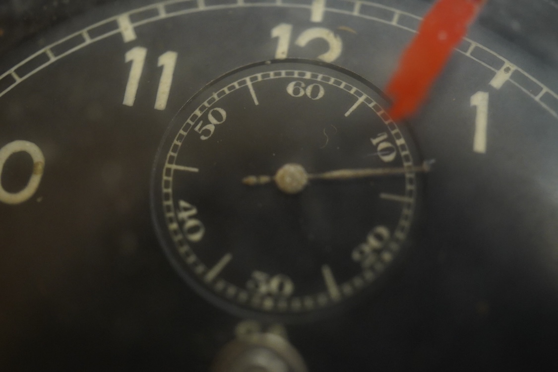 A Smiths 8 Day military aircraft clock, 8cm diameter